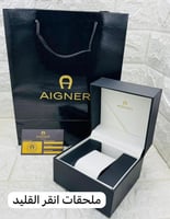 ساعة انقر ذهبي بإطار أبيض ماستر كوبي