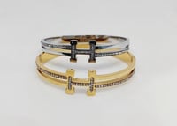 ٢ اساور هرمز فضي وذهبي شامل الملحقات