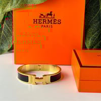 سوارة هرمز ذهبي و أسود شامل الملحقات