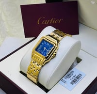 ساعة كارتير ذهبي بإطار كحلي شامل الملحقات