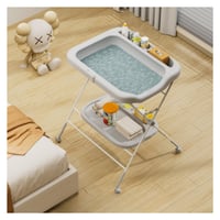 طاولة تغيير و تنظيم اغراض الاطفال مع حوض استحمام ق...