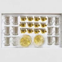 طقم فناجين وبيالات مخطط بقاعدة ذهبي وصحون معدنية ٣...