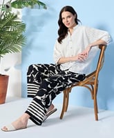 طقم نسائي ابيض واسود بنقشة