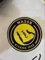 تيشيرت النصر الثالث 2025/26 مُوقع من نجوم الفريق