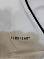 تيشيرت الأهلي البديل 2025/26 مُوقع من نجوم الفريق