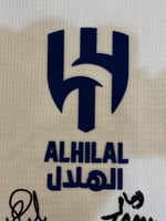 تيشيرت الهلال الاحتياطي 2025/26 مُوقع من نجوم الفر...