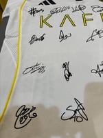 تيشيرت النصر الثالث 2025/26 مُوقع من نجوم الفريق