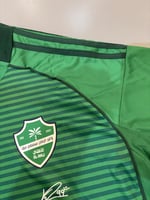 تيشيرت الأهلي البديل 2025/26 مُوقع من نجوم الفريق