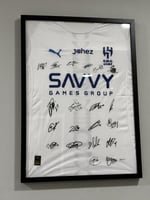 لوحة تيشيرت الهلال الاحتياطي 2025/26 مُوقعة من نجو...