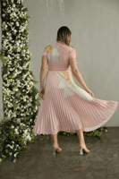 طقم ساندرا لاطلاله جذابه بلوزه وتنوره طويله بتصميم...