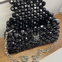 شنطة لون اسود حجم صغير