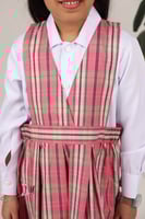 مريول روضه مطاط جانبين مربعات مقلم وردي 0102