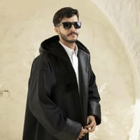 فروه قماش جوخ مع جلد على الأطراف