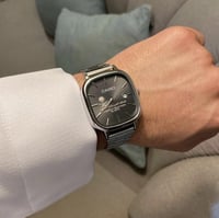 ساعة كاسيو بشعار المملكة الالوان ( تيتانيوم - تيتا...