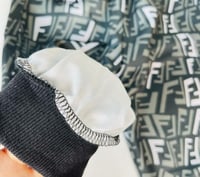 طقم من قطعتين اللون زيتي