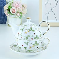 طقم إبريق شاي وفنجان برائحة الفراولة البرية، يتضمن...