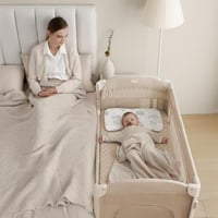 سرير ومحبس متنقل مع طاولة تغيير