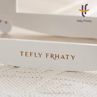 سلة موسى مع حامل هزاز أبيض