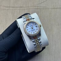 ساعة رولكس ديت جست روليسور أصفر – مينا لؤلؤية مرصّ...