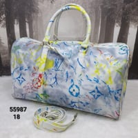 شنطة سفر Louis Vuitton