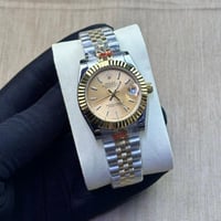 ساعة رولكس ديت جست ذهبي بمينا شامبين مقاس 31