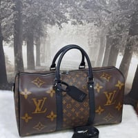 شنطة سفر من لويس فيتون