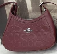 حقيبة كوتش نسائية