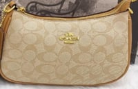 حقيبة كوتش نسائية