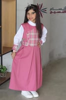 مريول ابتدائي مع قصه في الصدر كاروهات