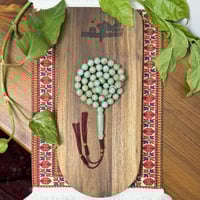 مسباح لون فيروزي -كركوشة-