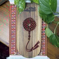 مسباح بكلايت أحمر شفاف