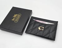 بوك (للجنسين)من ماركة كوتش (Coach)