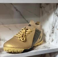 حذاء رجالي كرة قدم من ماركة أديداس باللون الذهبي