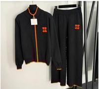 طقم بيجامة نسائي من هيرميس Hermiz باللون الأسود وا...