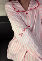 بيجاما أنثوية مخططة بتفاصيل أنيقة