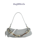 حقيبة يد نسائية باللون الرمادي مع تفاصيل ذهبية