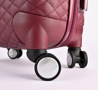 حقيبة سفر جلد عنابي