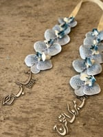 عقد تخرج من ورد الاوركيد -متجر الرياض