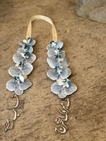 عقد تخرج من ورد الاوركيد -متجر الرياض