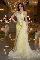 فستان سهرة ليموني ملكي بقصة متميزة وتفاصيل فاخرة