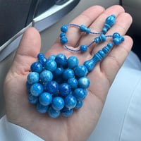 فاتوران تمليكه ازرق مموج