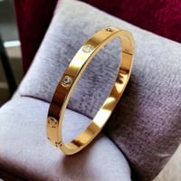 إسوارة كارتير لوف حبه ساده وحبه زركون مع ختم البرا...