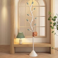 علاقة ملابس فاخرة بتصميم شجرة أنيقة، تضيف لمسة أنا...