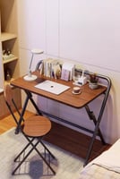 طاولة مكتب قابلة للطي بتصميم ذكي وعملي، وتناسب الا...