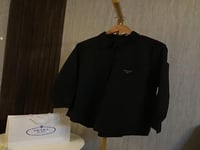 قميص برادا نسائي