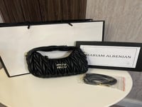 حقيبة ميو ميو بناتي