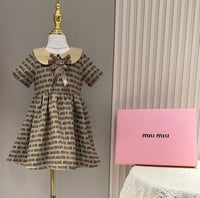 فستان ميو ميو