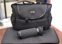 حقيبة مواليد قوتشي