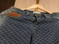 بنطلون قوتشي مع حزام