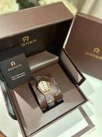 ساعة اقنر فضي وذهبي